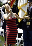 Jessica Simpsn sings the National Anthem at the AT&T National golf tournament in Bethesda, Maryland